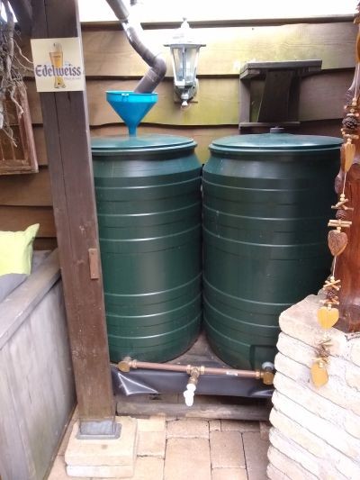 Regentonnen in serie Regentonnen in serie, communicerende vaten